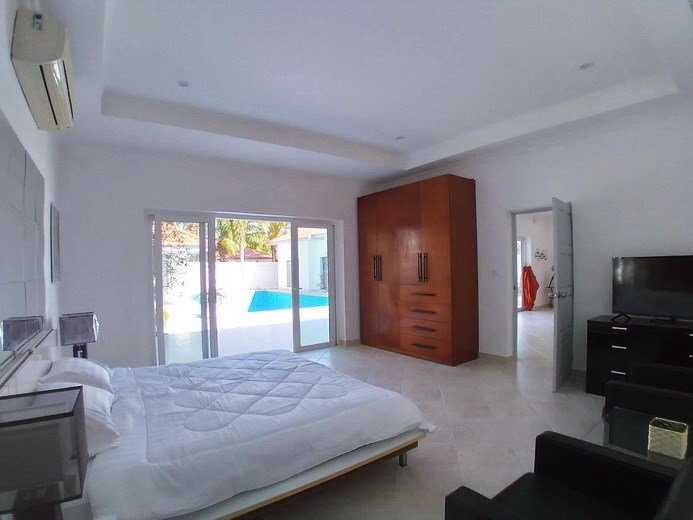 House for sale Pratumnak Pattaya showing the master bedroom pool view 
