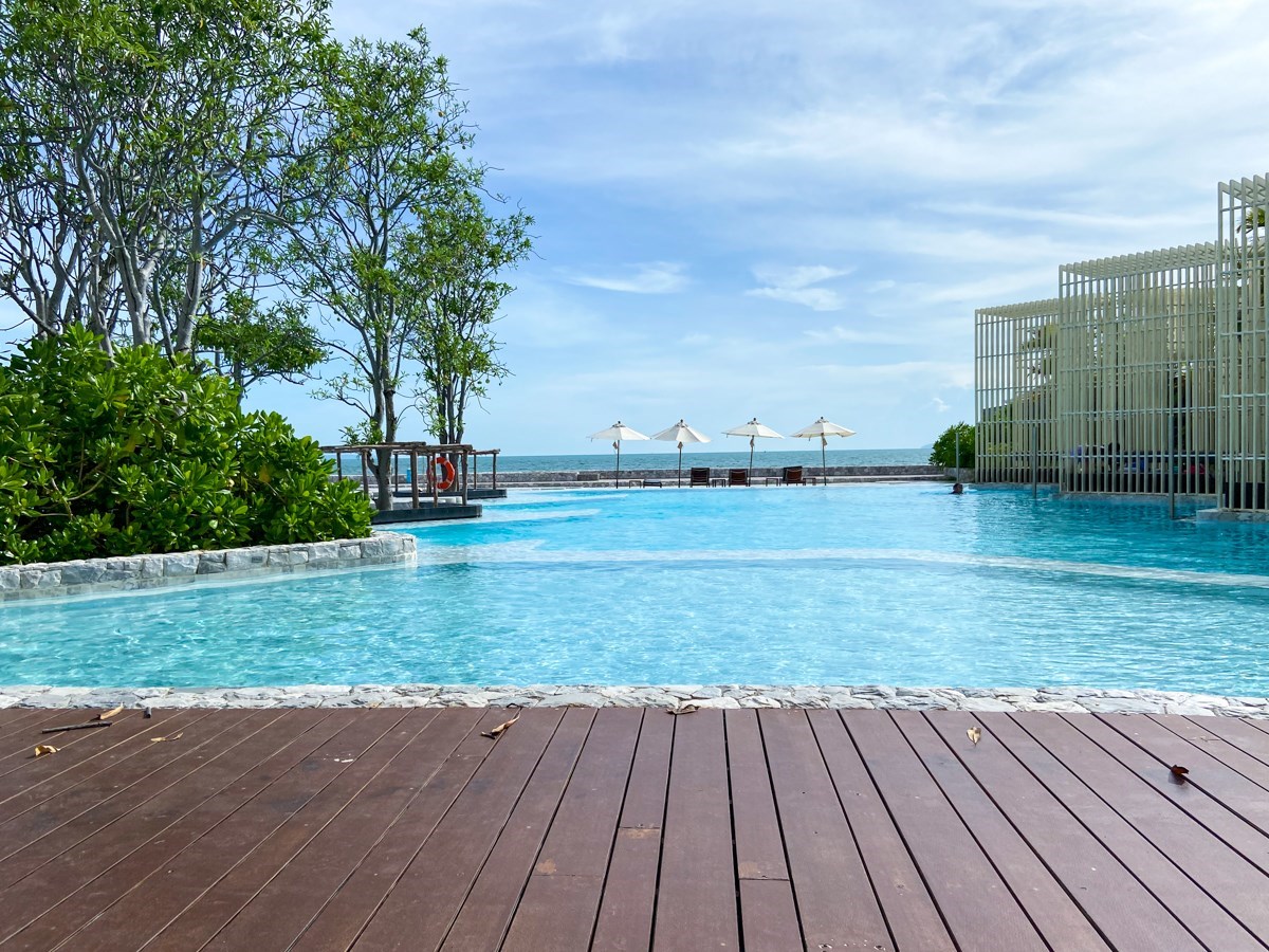 Condo for sale Na Jomtien Pattaya showing the Beach Pool Deck