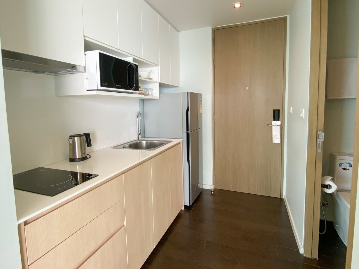 Condo for sale Na Jomtien Pattaya showing the Kitchen and Entrance