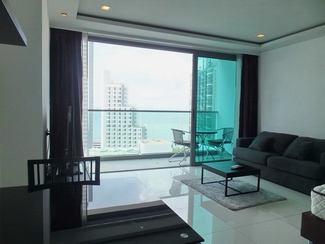 Condominium for rent Wong Amat Tower showing the living, dining and balcony 