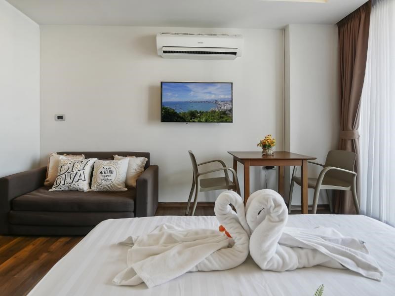 Condominium for sale Pratumnak showing the living and dining areas Condominium for sale Pratumnak showing the living and dining areas