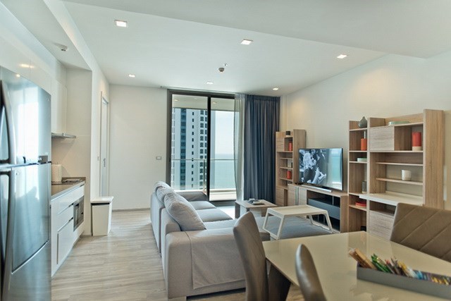 Condominium for sale Wongamat Pattaya showing the dining and living areas Condominium for sale Wongamat Pattaya showing the dining and living areas