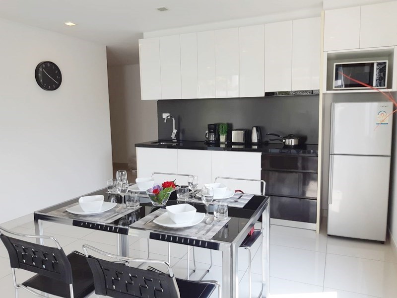 Condominium for sale Pratumnak Pattaya showing the dining and kitchen areas Condominium for sale Pratumnak Pattaya showing the dining and kitchen areas