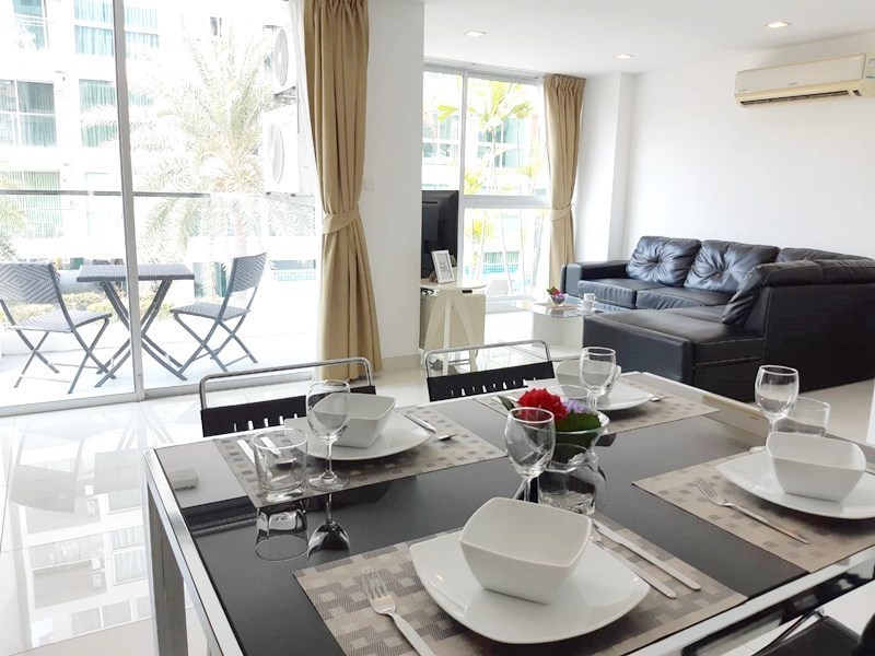 Condominium for sale Pratumnak Pattaya showing the living, dining and balcony Condominium for sale Pratumnak Pattaya showing the living, dining and balcony
