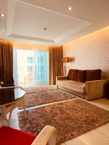 Condominium for sale Pratumnak Pattaya showing the living area and balcony Condominium for sale Pratumnak Pattaya showing the living area and balcony