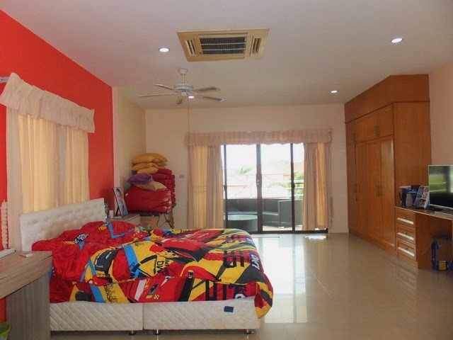 House for Sale Mabprachan Pattaya showing the master bedroom with furniture 