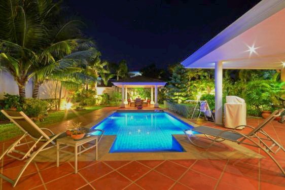 House for sale Siam Royal View Pattaya showing the pool and terraces at night House for sale Siam Royal View Pattaya showing the pool and terraces at night
